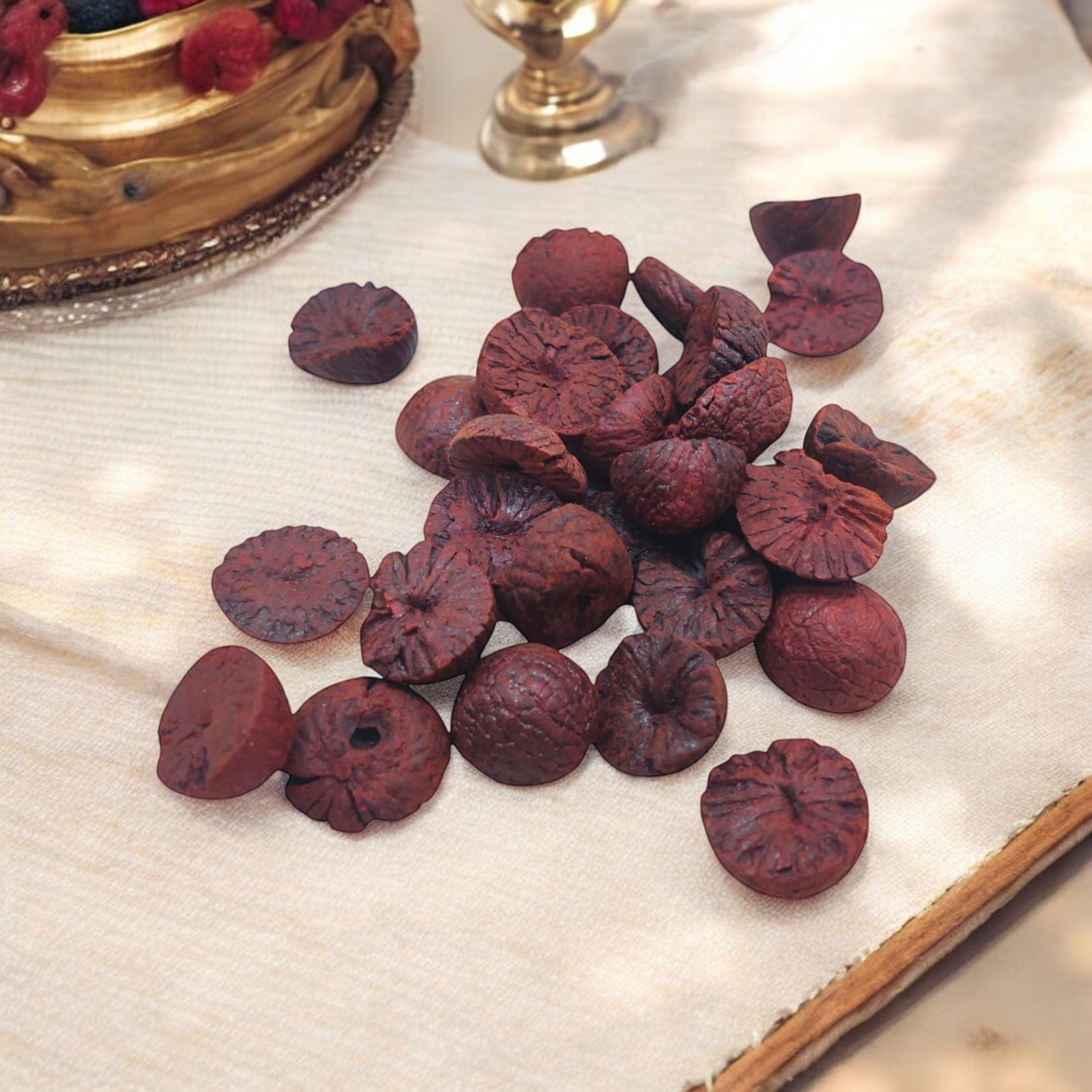 Dried fruits on a textured surface with a blurred background