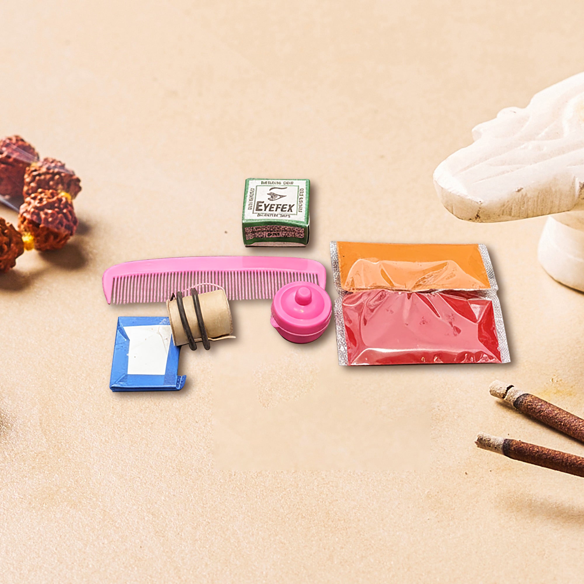 Bagina set contents including kajal, kumkum, mauli thread, comb and mirror case