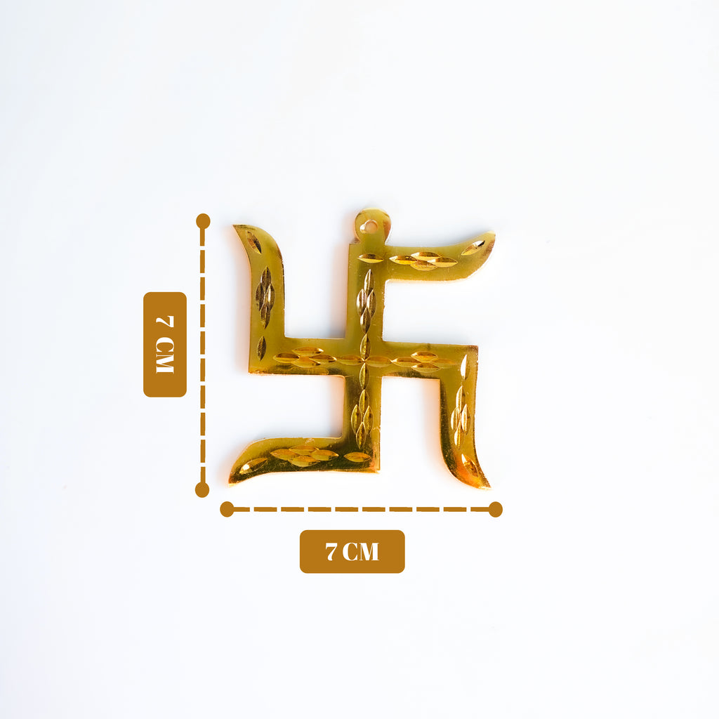 Gold swastika symbol with measurements on a white background