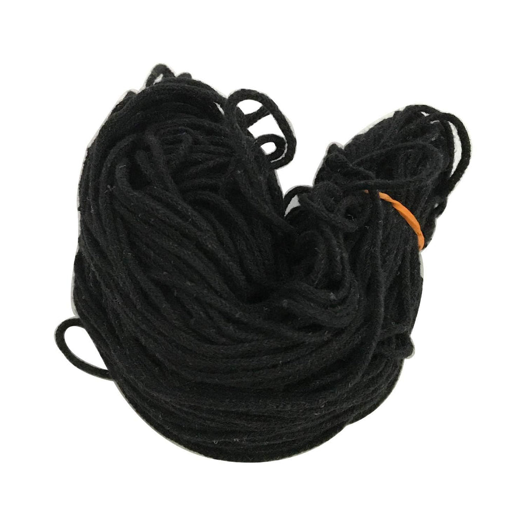 Coiled black rope with an orange tag on a white background