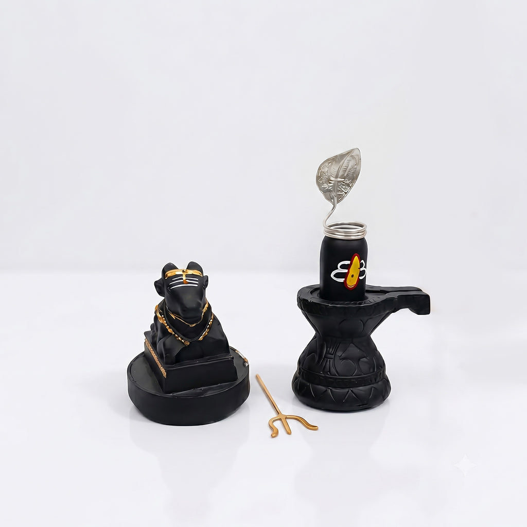 Black and gold decorative items on a white background