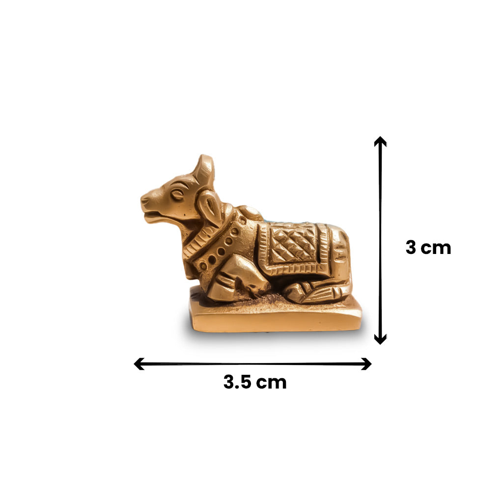 Small gold-colored figurine with dimensions indicated on a white background