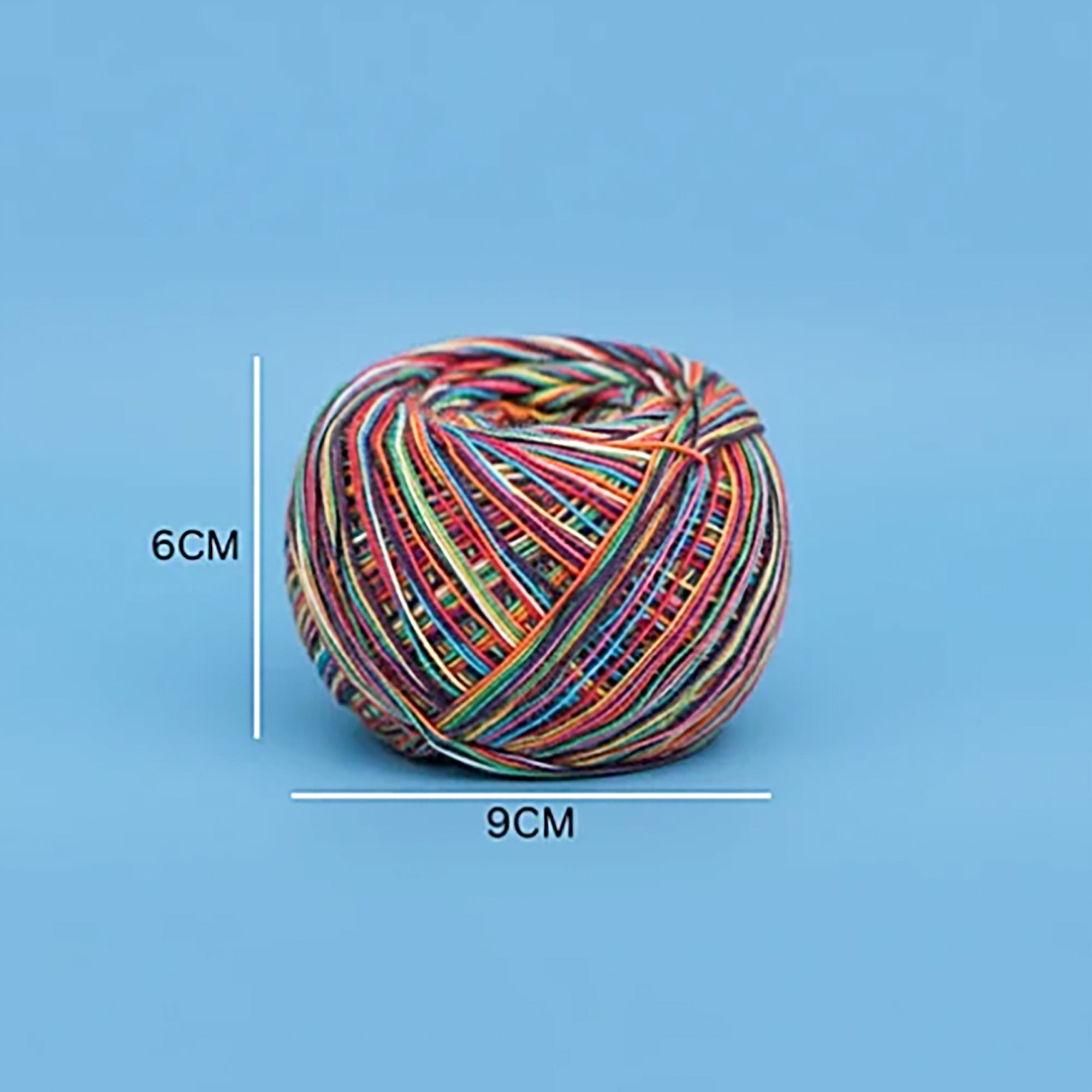 Multicolored ball of yarn with measurements on a blue background
