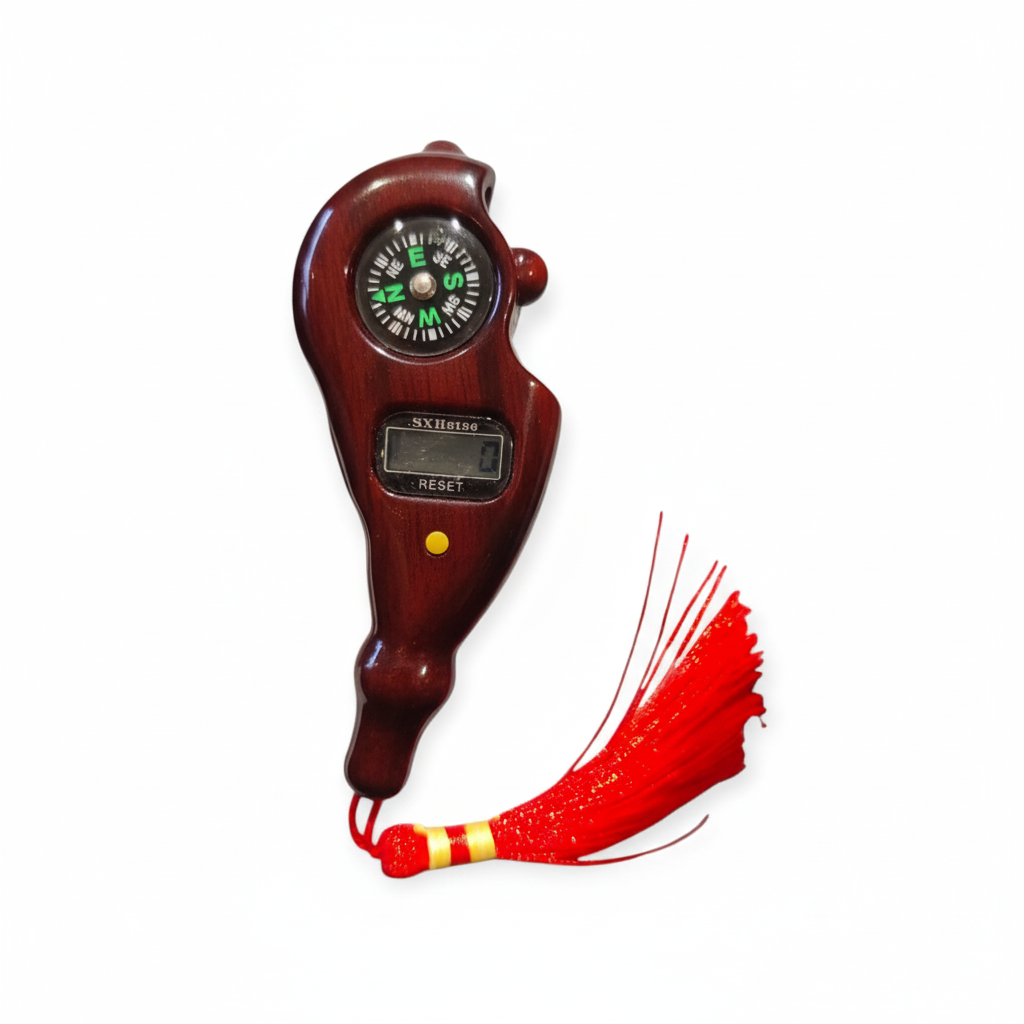 Wooden compass with digital display and red tassel on a white background