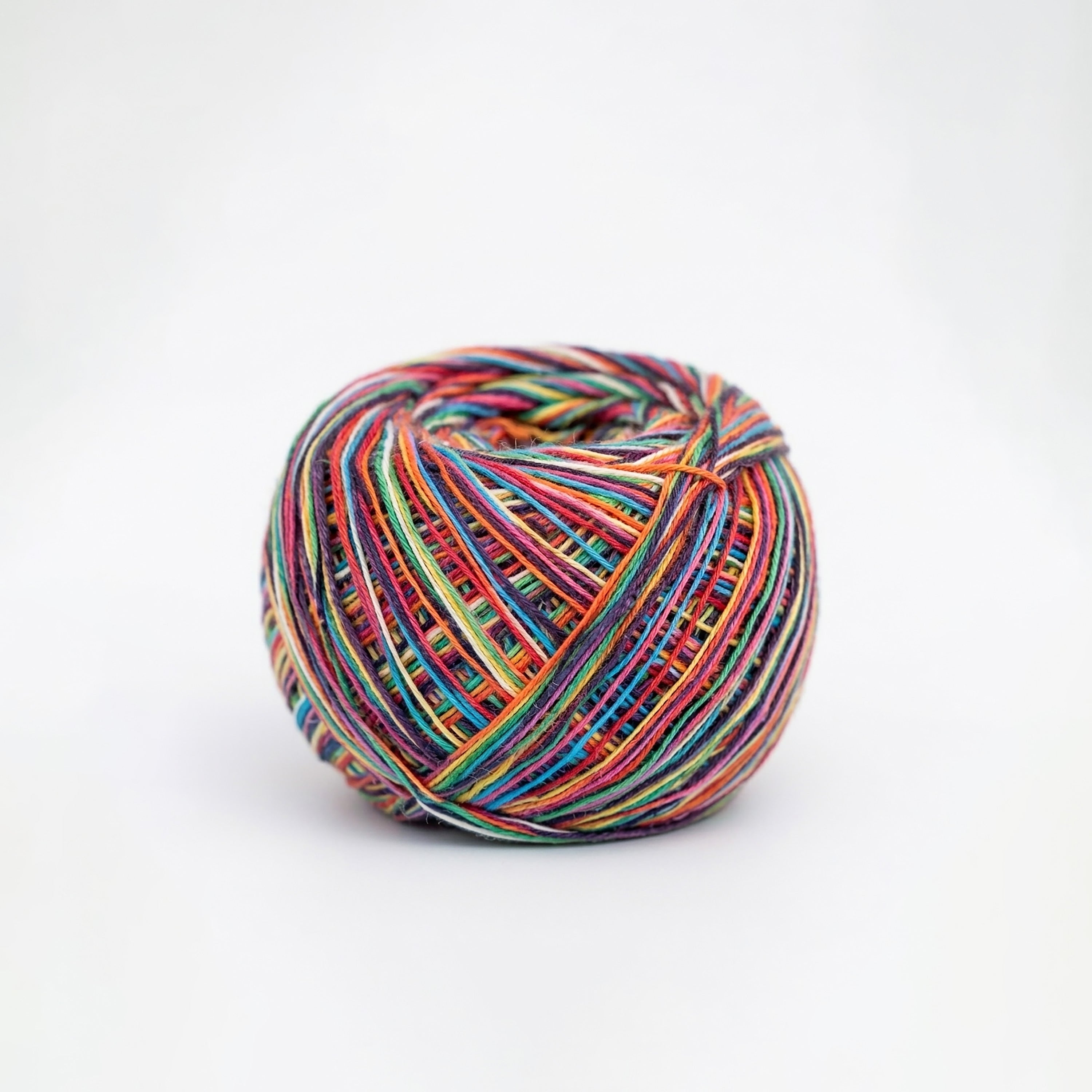 Multicolored skein of yarn on a white background